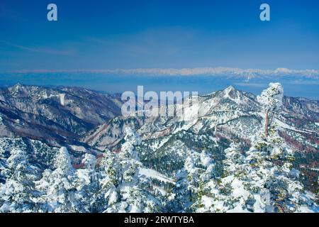 Mt. Yokote and Mt. Shiroumadake and other mountains in the Northern Alps Stock Photo