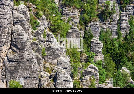 Picturesque view of the rocky outcrops of the Elbe Sandstone Mountains in the Bastei rock formation area, Saxon Switzerland, Saxony, Germany. Stock Photo