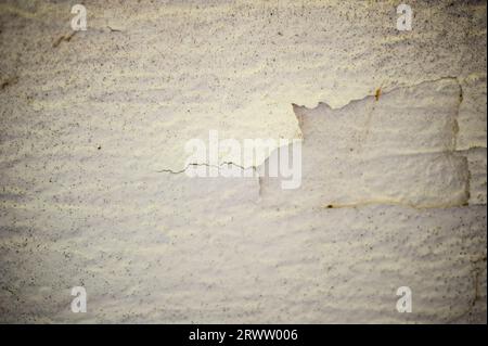 Wall with cracks and cracked paint Stock Photo