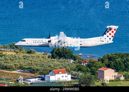 Split, Croatia - May 28, 2023: Croatia Airlines De Havilland Canada Dash 8 Q400 airplane at Split Airport (SPU) in Croatia. Stock Photo
