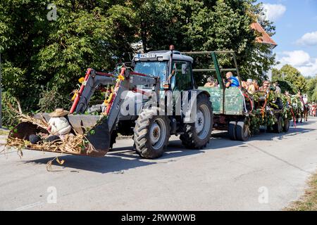 Traditional Hungarian harvest parade on September 16, 2023 in village Tapolca-Diszel of Hungary. Traditional hungarian clothes. Stock Photo