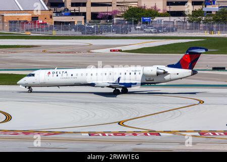 Chicago, United States - May 4, 2023: Delta Connection SkyWest Airlines Bombardier CRJ-700 airplane at Chicago Midway Airport (MDW) in the United Stat Stock Photo
