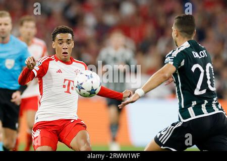Muenchen, Deutschland. 20th Sep, 2023. v. li. Jamal Musiala (FC Bayern Muenchen, 42) und Diogo Dalot (Manchester United, 20), Fussball, Uefa Champions League, Bayern M?nchen - Manchester United am 20.9.2023 in der Muenchner Allianz Arena. DFL REGULATIONS PROHIBIT ANY USE OF PHOTOGRAPHS AS IMAGE SEQUENCES AND/OR QUASI-VIDEO. Credit: dpa/Alamy Live News Stock Photo