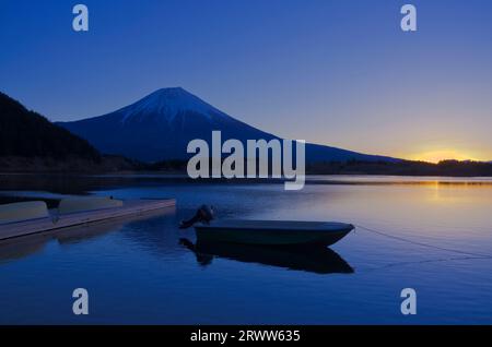 Lake Tanuki before sunrise with Mt. Fuji and upside down Mt. Stock Photo