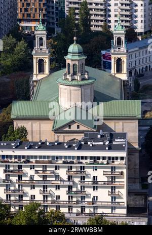 apartment block beside All Saints Church, Warsaw, Poland Stock Photo