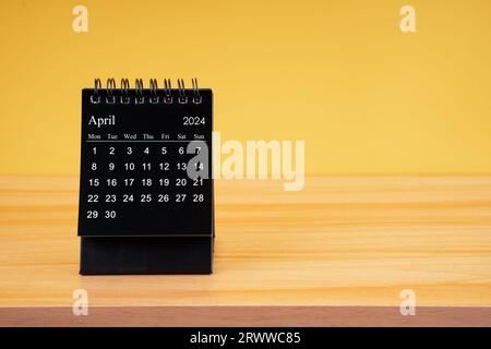 April monthly desk calendar for 2024 year and model dentures on the table.  Dental health concepts Stock Photo - Alamy