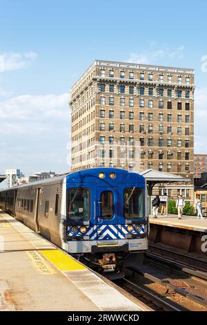 New York City, United States - May 11, 2023: Metro-North Railroad commuter train public transport at Harlem 125th Street railway station in New York, Stock Photo