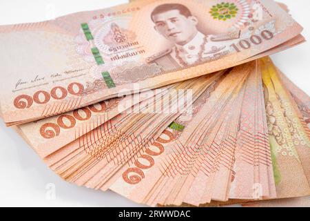 Heap of Thai 1,000 baht banknotes issued by the Bank Of Thailand. Stock Photo