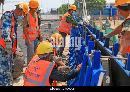 luannan county, China - June 16, 2023: Construction workers working on bridge construction sites, North China Stock Photo