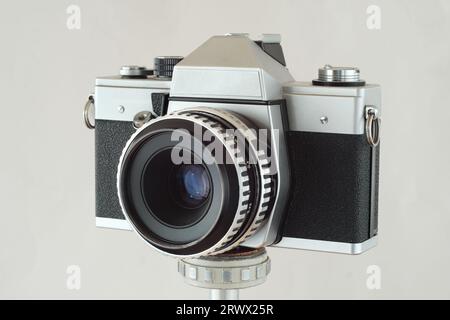 vintage slr photo camera on bright background,free copy space Stock Photo