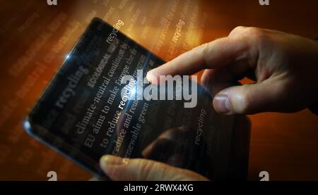 Recycling sustainable economy, environment care and ecology social media on display. Searching on tablet, pad, phone or smartphone screen in hand. Abs Stock Photo