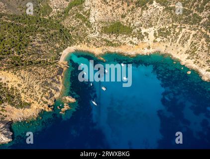 Aerial view, bay with rocky beach Cala D'Egos, sailboats and catamarans in deep blue sea, Andratx, Balearic Islands, Majorca, Spain, Balearen, Cala Eg Stock Photo