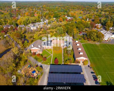 Wayland historic town center aerial view in fall with fall foliage at Boston Post Road and MA Route 27, including First Parish Church and Town Hall, W Stock Photo