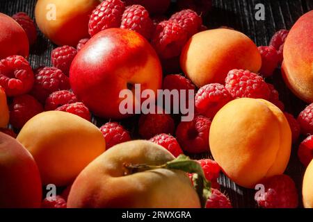 summer fruits mix on wood background Stock Photo