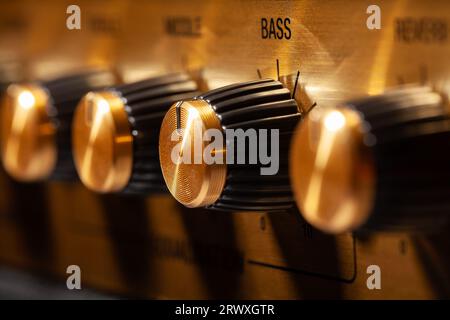guitar amp equalizer bass knob control Stock Photo