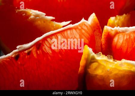 sliced grapefruit orange on wood background Stock Photo