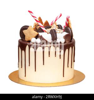 Two layered birthday cake with blue frosting, purple cupcakes, and chocolate decorations isolated on white background, copy space, png Stock Photo