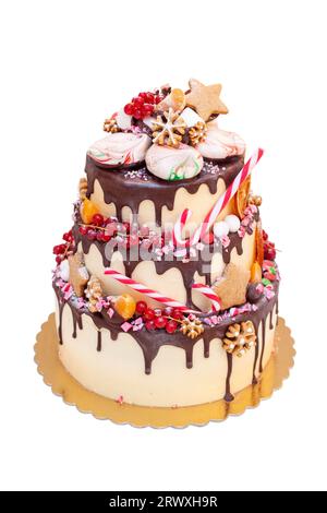 Two layered birthday cake with blue frosting, purple cupcakes, and chocolate decorations isolated on white background, copy space, png Stock Photo