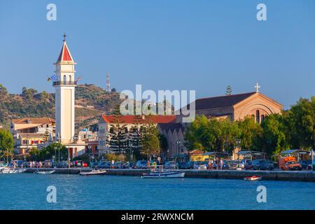 Zakynthos, Greece - August 14, 2016: Zante port seaside view, ordinary people and cars are on the coastal street Stock Photo