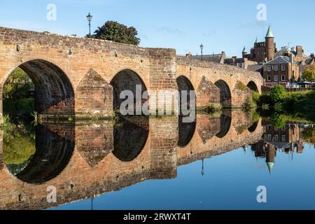 Devorgilla Bridge (or Old Bridge) is one of Scotland's oldest standing bridges. It spans the River Nith in Dumfries Stock Photo