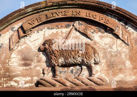 We Live in Hope carved onto a grave in St Michael's Church cemetery, Dumfries, Scotland Stock Photo
