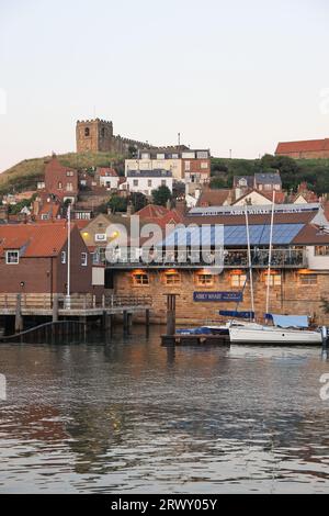 Restaurant & bar on Abbey Wharf, on Whitby Harbour, formerly called the Shambles or Sandgate, which was lined with butchers' shops, in North Yorkshire Stock Photo