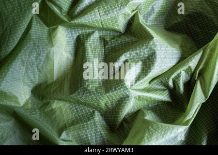 closeup of green nylon checkered tent fabric, texture background Stock Photo