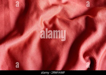 closeup of red polyester sport fabric, texture background Stock Photo