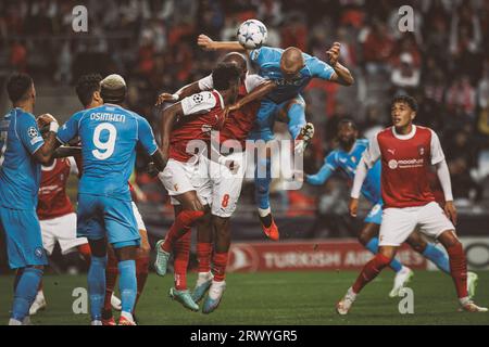 Players of both teams fight for ball during  UEFA Champions League 2023/24 game between SC Braga and SSC Napoli at Estadio Municipal de Braga, Braga, Stock Photo