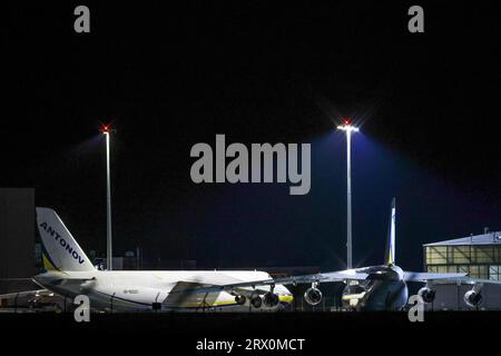 Schkeuditz, Germany. 22nd Sep, 2023. Two Antonov An-124 cargo aircraft are parked at Leipzig-Halle Airport. These aircraft can carry up to 120 tons of load and, due to their robust design, are also suitable for landings on unpaved runways or even snow. They are also regularly used for relief missions to disaster areas. On the same day, a transport of relief supplies to flood-hit Libya is scheduled to take off. Credit: Jan Woitas/dpa/Alamy Live News Stock Photo