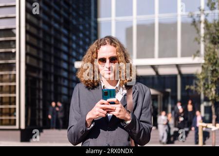 young business man using mobile phone Stock Photo