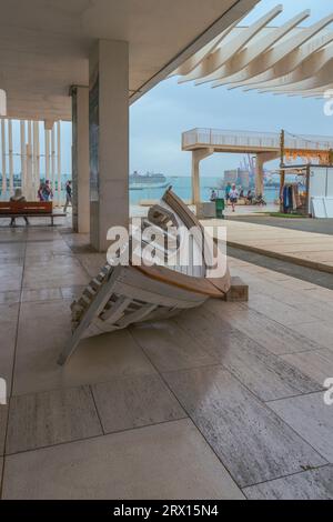 Public promenade in Malaga, Parmeral de las Sorpresas.  Around of Alborania Aula Del Mar at daylight. Sea Museum in Malaga.  Harbour quay at sunny day. Stock Photo