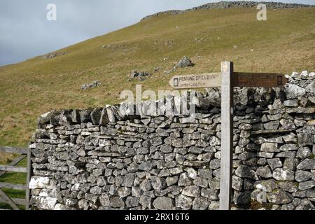 Wooden Signpost for Pennine Bridleway to Lambert Lane on Stockdale Lane near Settle in the Yorkshire Dales National Park, England, UK. Stock Photo