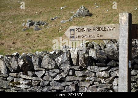 Wooden Signpost for Pennine Bridleway to Lambert Lane on Stockdale Lane near Settle in the Yorkshire Dales National Park, England, UK. Stock Photo