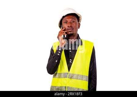 entrepreneur man standing on white background talking on cellphone. Stock Photo