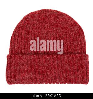 Heather red knitted winter bobble hat of traditional design flat lay isolated on white background Stock Photo
