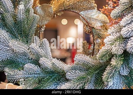 closeup of christmas tree branches around an oval mirror.new year background Stock Photo