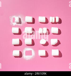 sweet marshmallow pattern on pink background. Minimal. Stock Photo