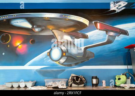 Spaceship mural in roadside diner Stock Photo