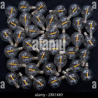 A still life, abstract view of a gathering of low energy, solar lighting, led light bulbs Stock Photo