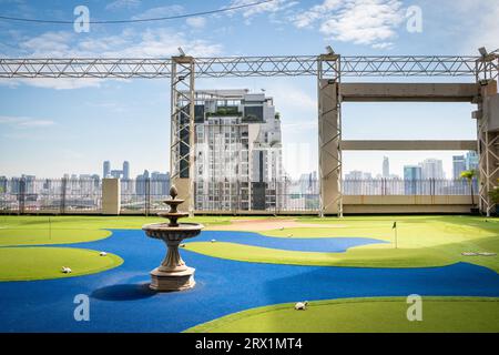 A golf putting course on the roof of The Baiyoke Sky Hotel in the Ratchathewi area of Bangkok, Thailand. Stock Photo