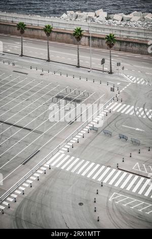 Empty parking space, zebra crossing, tyre tracks, no car, markings, lane marking Stock Photo