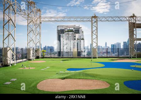 A golf putting course on the roof of The Baiyoke Sky Hotel in the Ratchathewi area of Bangkok, Thailand. Stock Photo