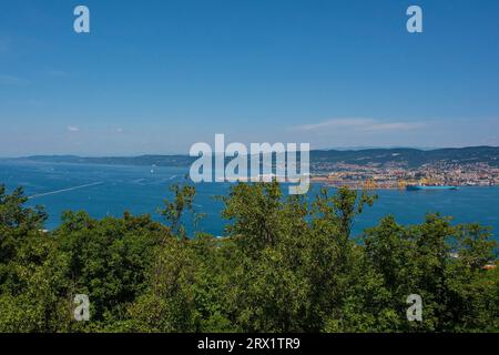 The port city of Trieste in Friuli-Venezia Giulia, north east Italy. Viewed from Muggia to the south Stock Photo