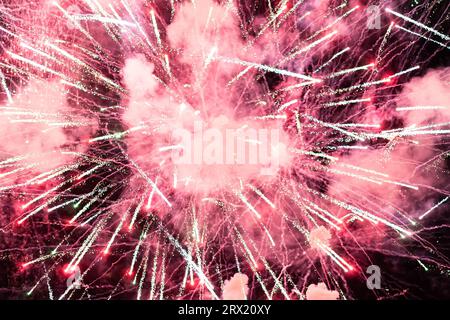 Pink Fireworks and white smoke with Abstract bokeh background Stock Photo