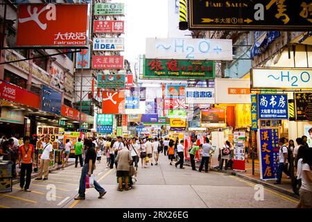 Hong Kong, China, June 17th 2007: Busy street during the day in Mongkok on Kowloon in Hong Kong Stock Photo