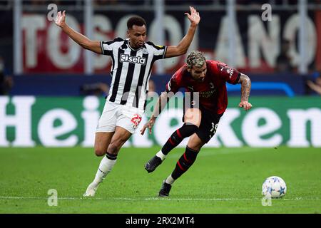 Theo Hernandez of AC Milan competes for the ball with Jacob Murphy of Newcastle United FC during the UEFA Champions League football match between AC Milan and Newcastle United FC. Stock Photo