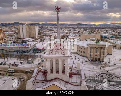 The Soviet red star (the symbol of USSR and communism) on the top of the tower built in Stalin's period in the downtown of Ulan-Ude, Buryatiya, Russia Stock Photo