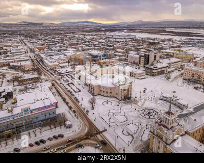 The downtown of the Siberian city of Ulan-Ude (Republic of Buryatiya, Russia), with the theater building, Soviet architecture, and city plaza Stock Photo