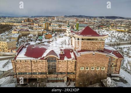 The theater building made in Oriental Buddhist architecture style in the city of  Ulan-Ude, Republic of Buryatiya, Russia. Stock Photo